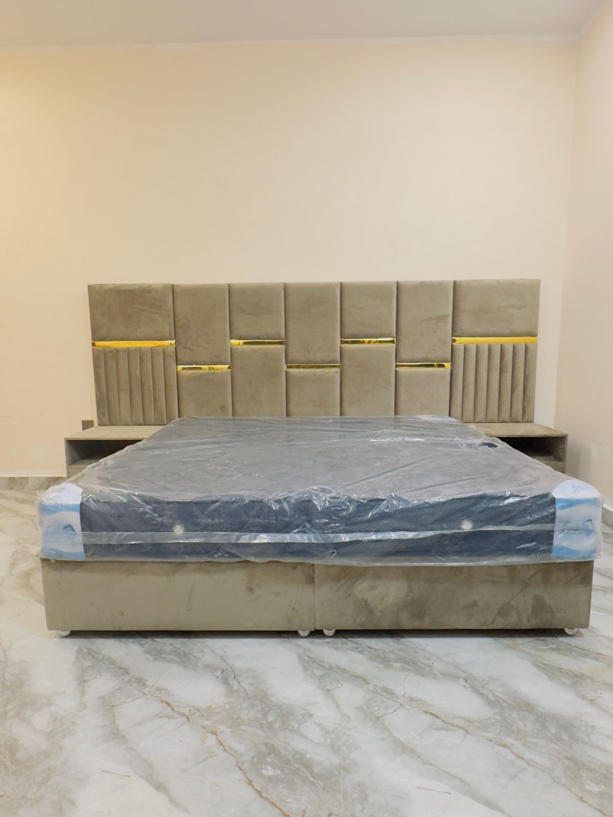 Luxury divan storage bed with gold accent headboard