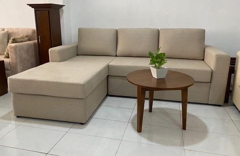 Beige L-shape sectional sofa with coffee table